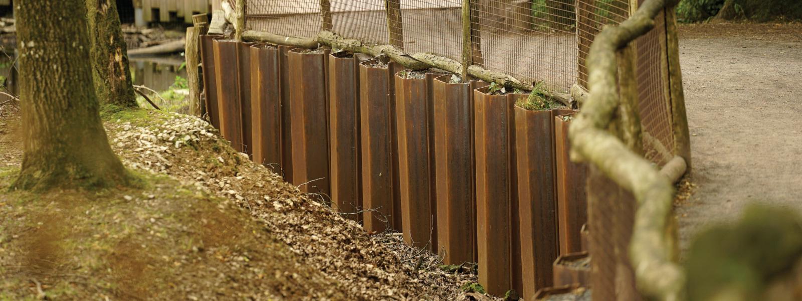 Sustainable enclosure solutions with steel sheet piles